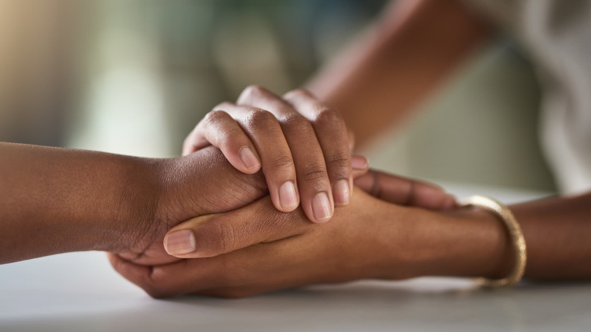 Parent holding child hand